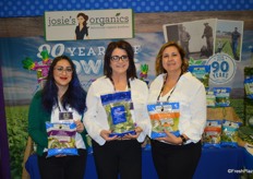 Andrea Lopez-Zavala, Elisha Cope and Heather Fuller with Braga Fresh showing salad kits and broccoli florets.